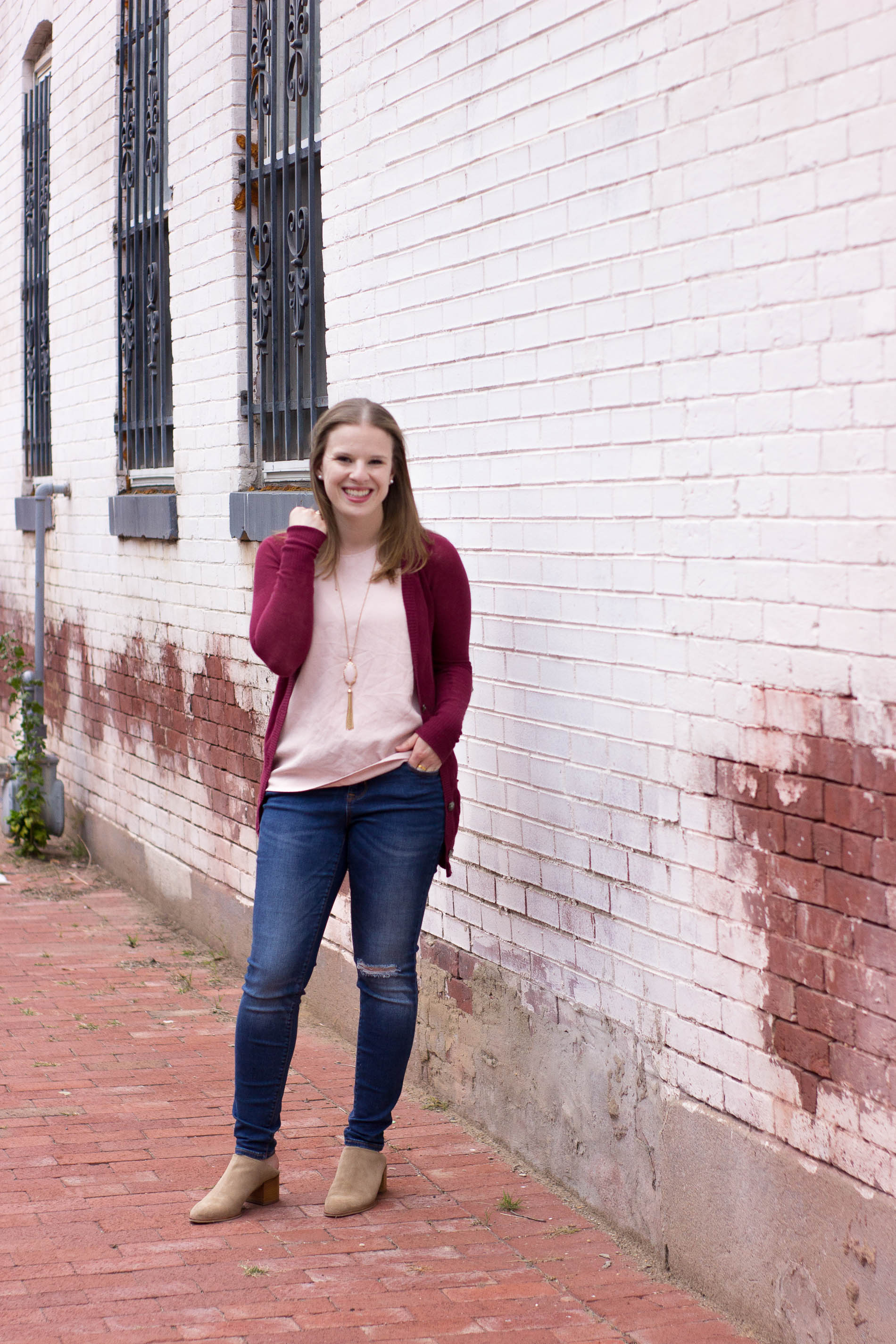 women wearing ripped skinny jeans with mule/clog hybrid women wearing ripped skinny jeans with mule/clog hybrid