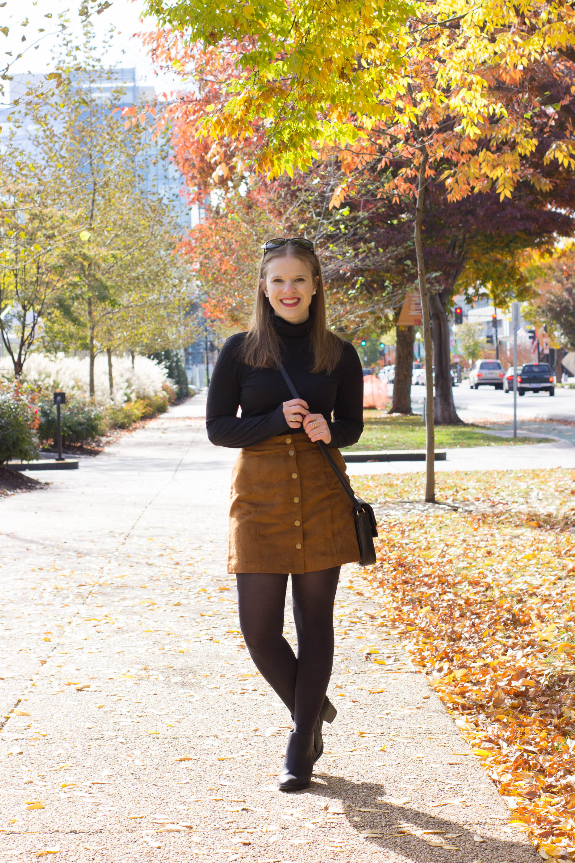woman wearing turtle neck top and skirt woman wearing turtle neck top and skirt
