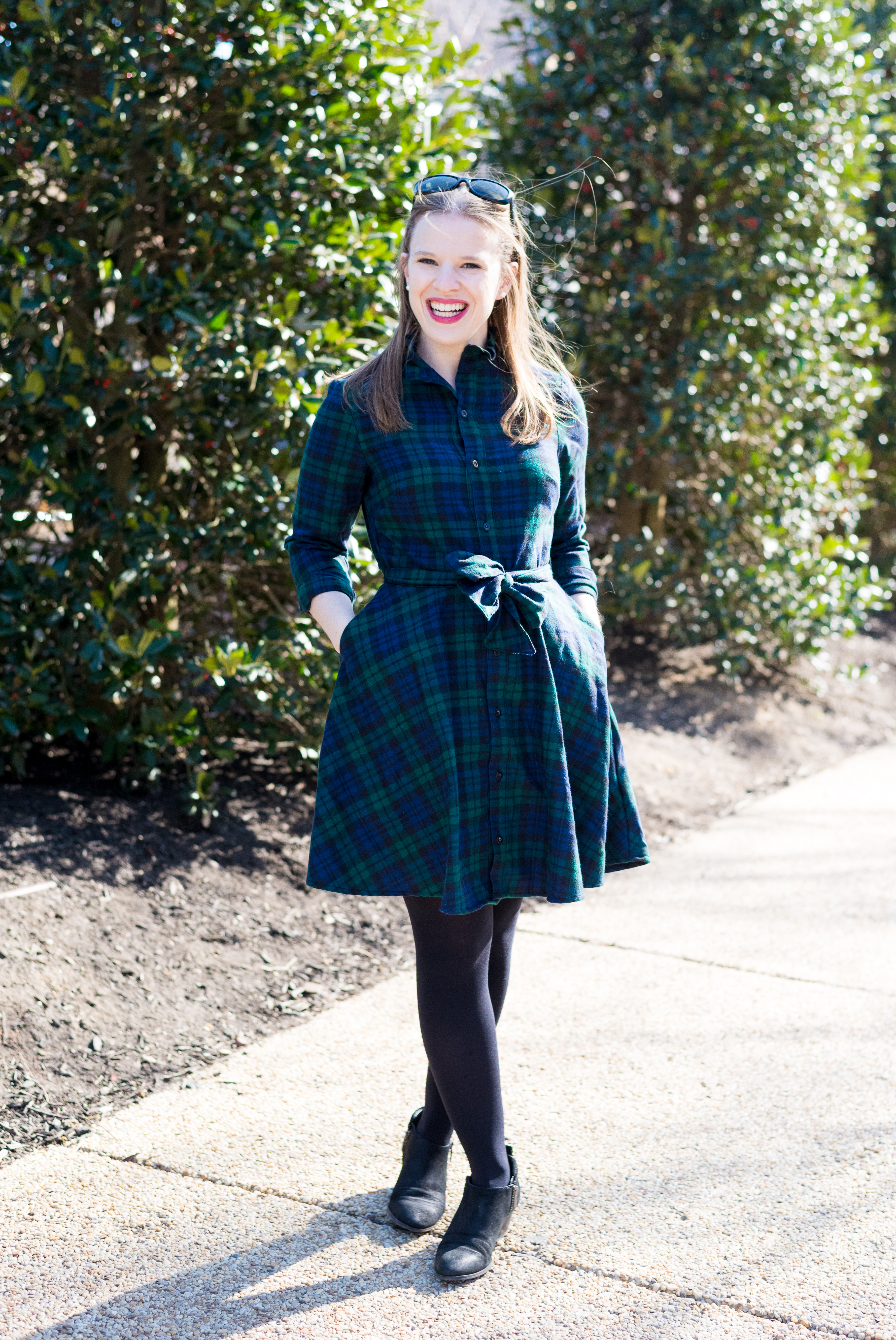 woman blogger wearing plaid dress and ankle boots for Cute Thanksgiving Outfit Ideas woman blogger wearing plaid dress and ankle boots for Cute Thanksgiving Outfit Ideas