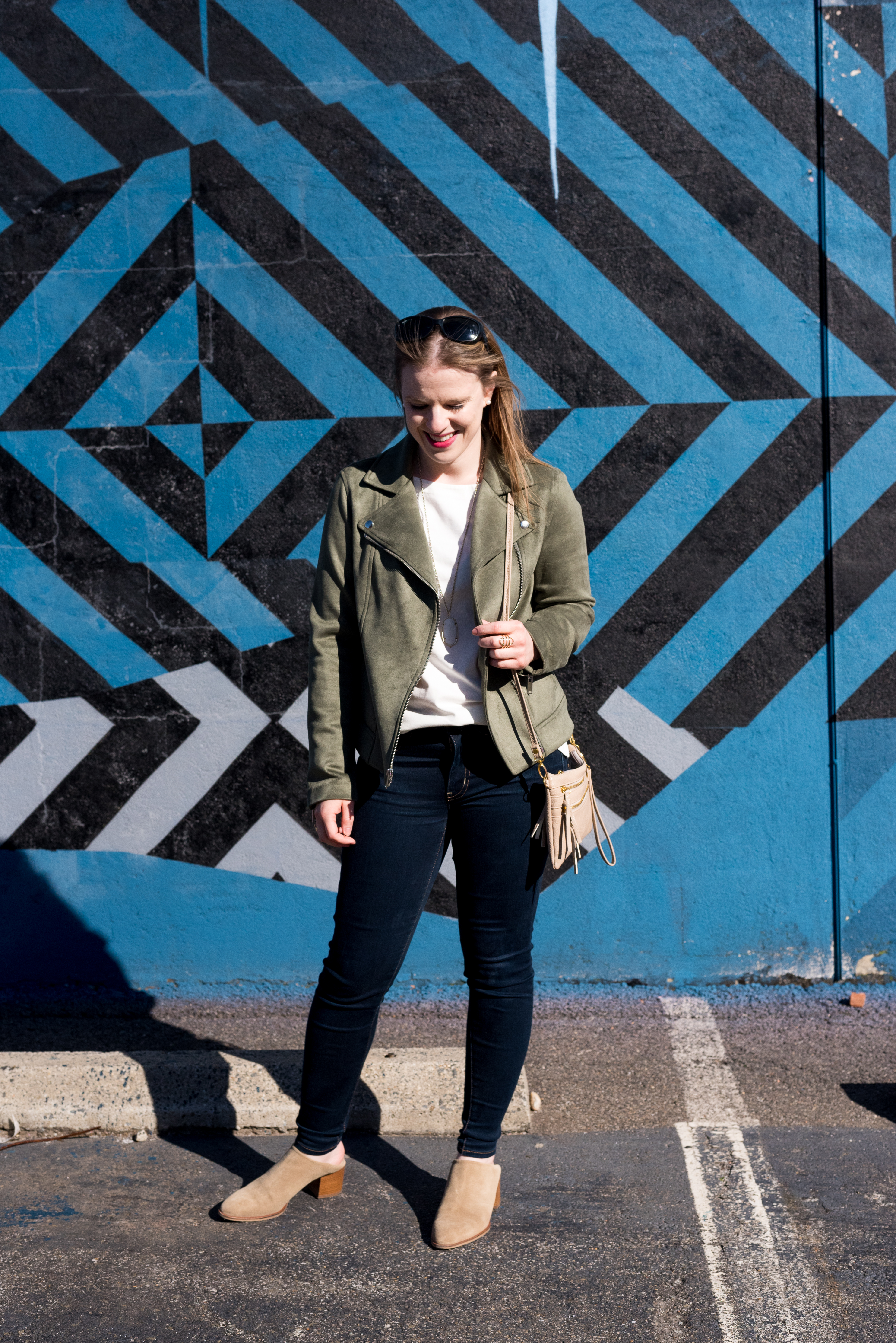 women wearing AEO Denim X Jegging, white top, and jacket one of the Outfits to Wear With Clogs women wearing AEO Denim X Jegging, white top, and jacket one of the Outfits to Wear With Clogs