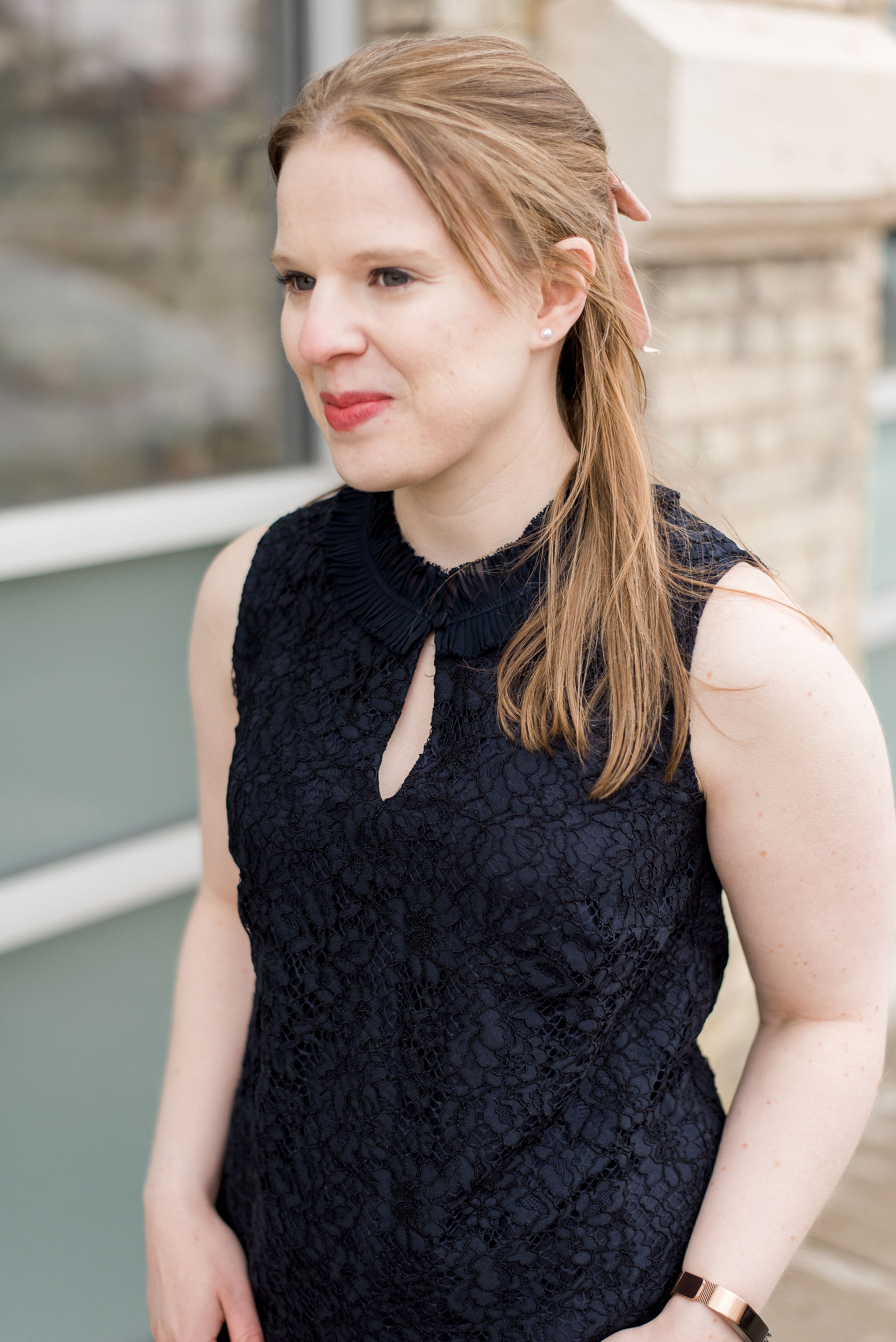 woman blogger wearing festive lace top
