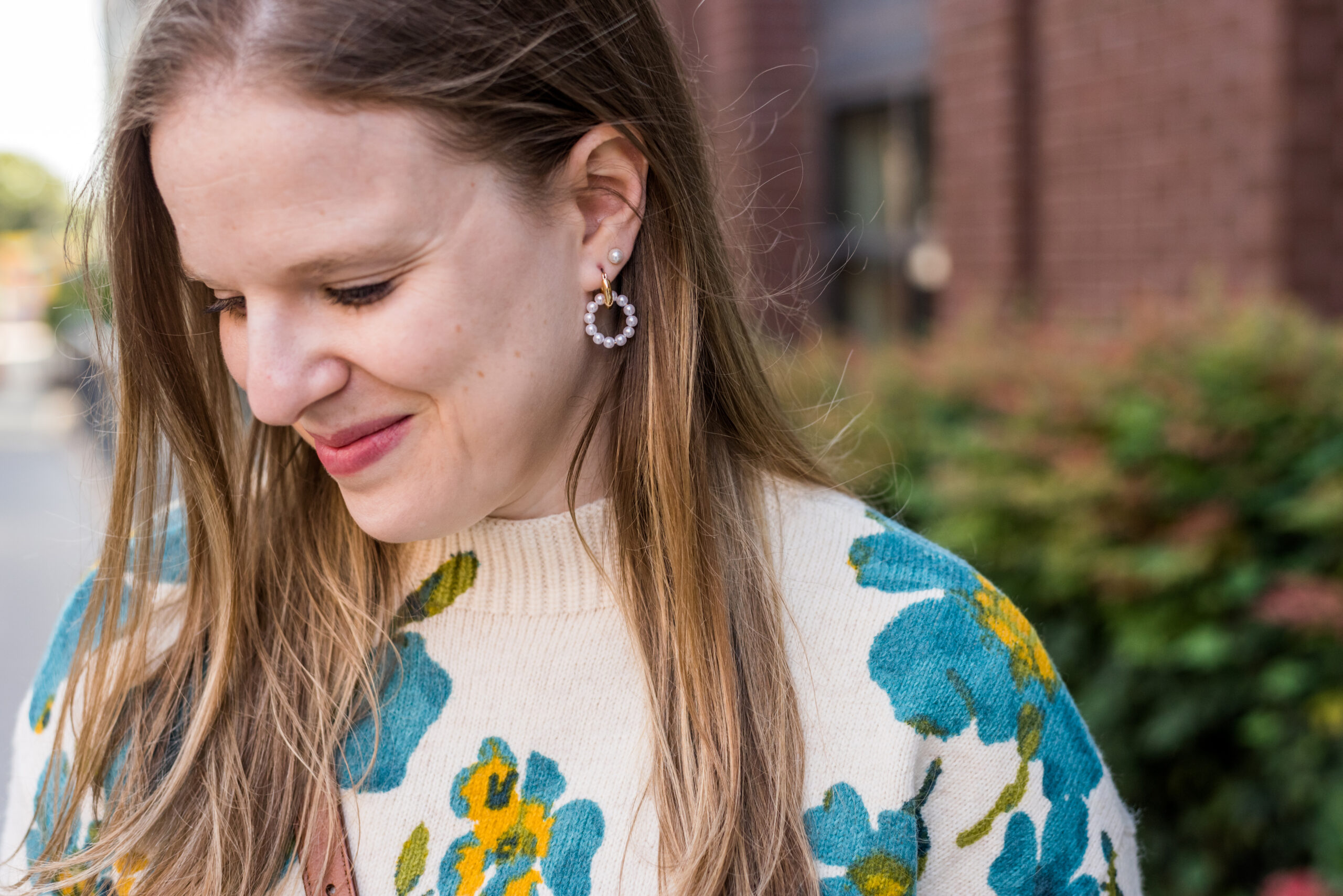 woman wearing J.Crew Earrings woman wearing J.Crew Earrings