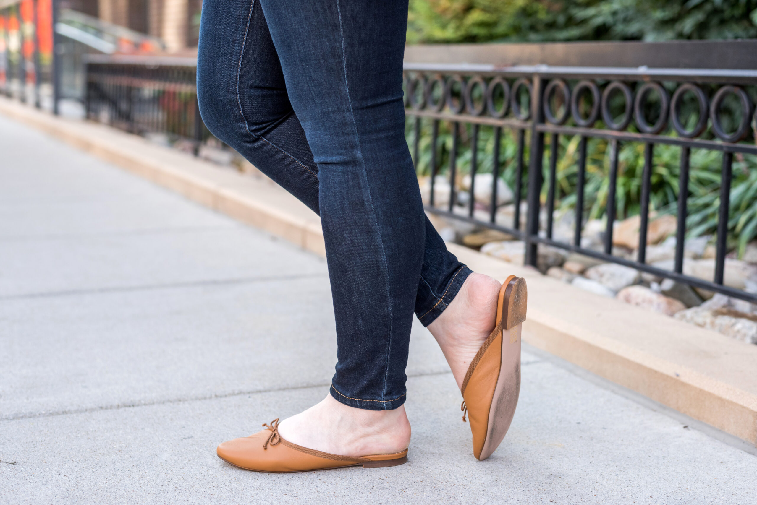 woman wearing j.crew mules woman wearing j.crew mules